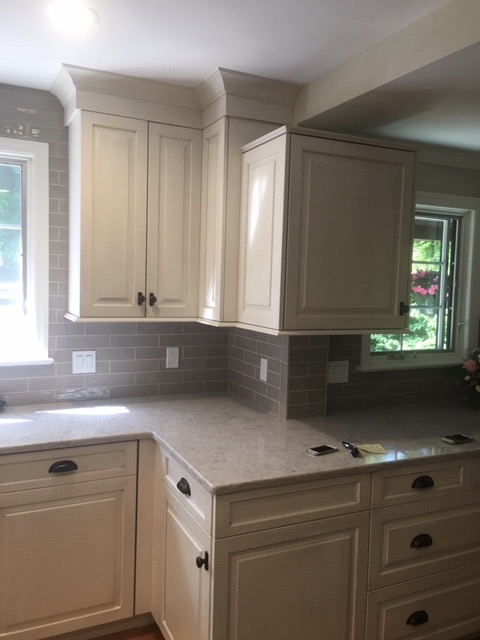 Designs by Dolores - Grey Kitchen Counter with White Cabinets