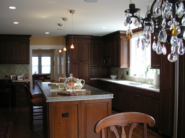 Designs by Dolores - Dark cabinets and floors with light grey counters