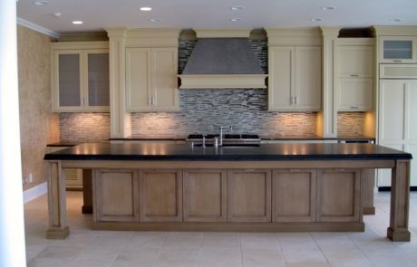 Designs by Dolores - Natural kitchen cabinets with large bar