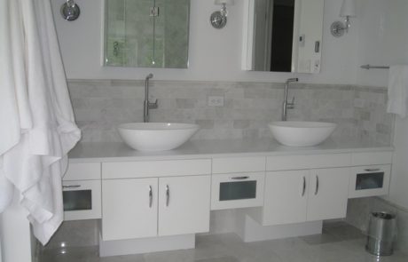 Designs by Dolores - White bathroom with light grey tile