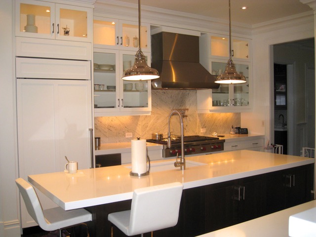 Designs by Dolores - White on white kitchen with built in fridge