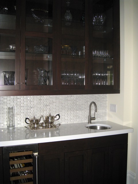 Designs by Dolores - Dark wetbar with white counters