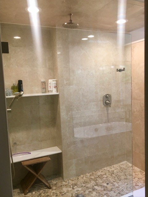 Designs by Dolores - Large tiled shower with ceiling shower head
