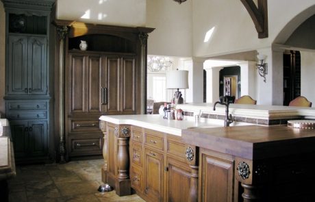 Designs by Dolores - Detailed kitchen matching various colors of cabinetry
