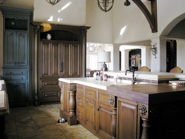 Designs by Dolores - Detailed kitchen matching various colors of cabinetry