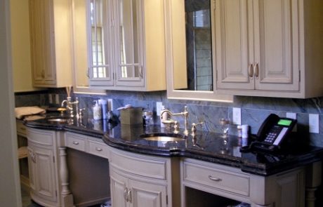 Designs by Dolores - Light bathroom cabinets with dark granite counters
